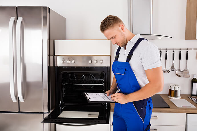 Gas Safe engineer issuing a certificate